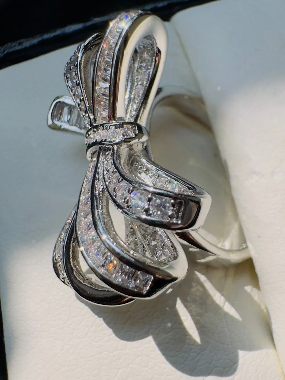 Diamond Bow Ring in Silver Tone - Elegant Sparkling Bow